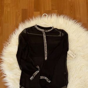 New with tags long sleeve blouse. Beading detail